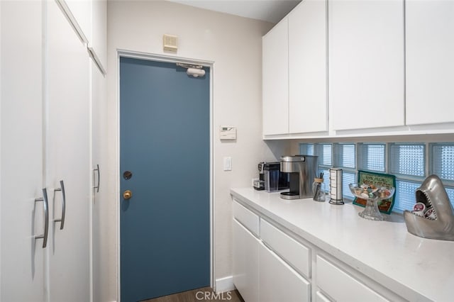 interior space with white cabinets