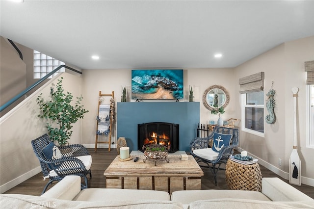 living room featuring dark wood-type flooring