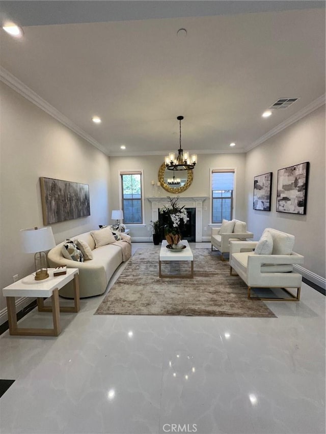 living room with a chandelier and crown molding