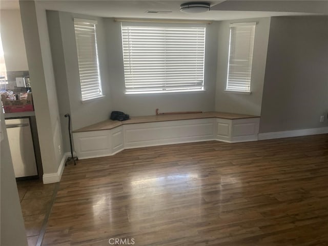 unfurnished room featuring dark hardwood / wood-style floors