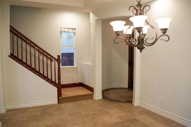 interior space with a chandelier