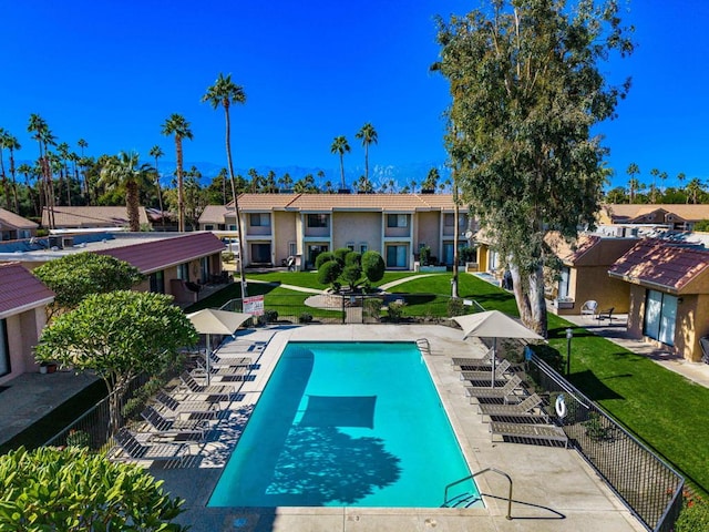 view of swimming pool with a patio area