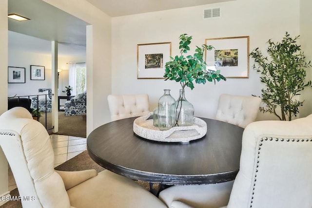 dining room featuring tile patterned flooring