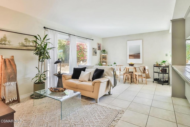 living room featuring light tile patterned flooring