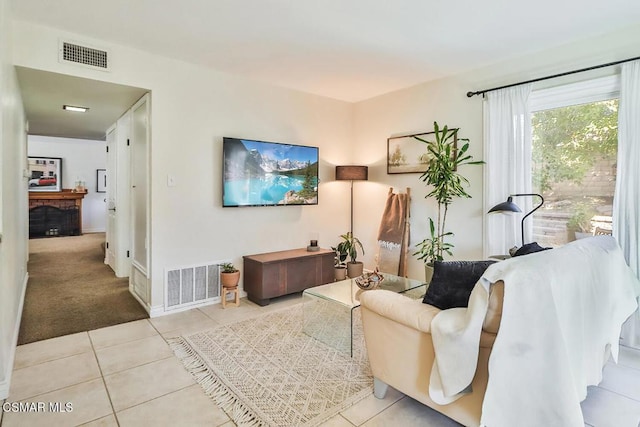 living room with light tile patterned floors