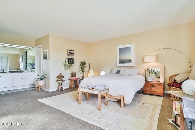 bedroom featuring light carpet