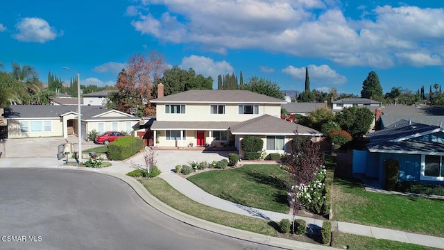 view of front facade with a front lawn