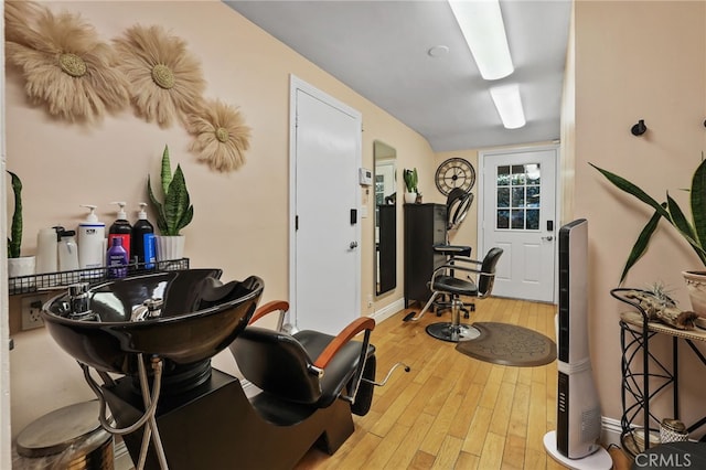 workout area featuring light hardwood / wood-style flooring