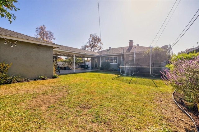 view of yard with a patio