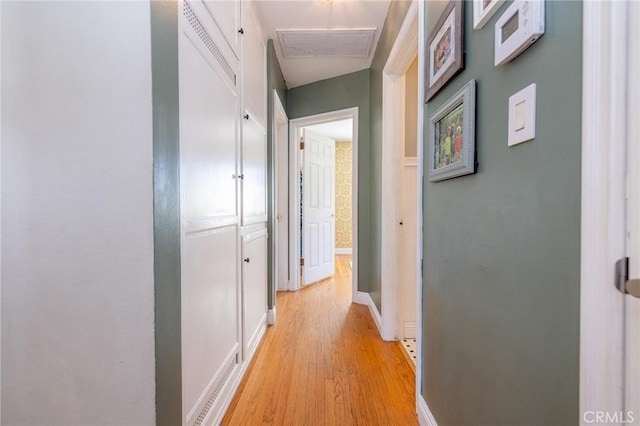 corridor featuring light hardwood / wood-style flooring