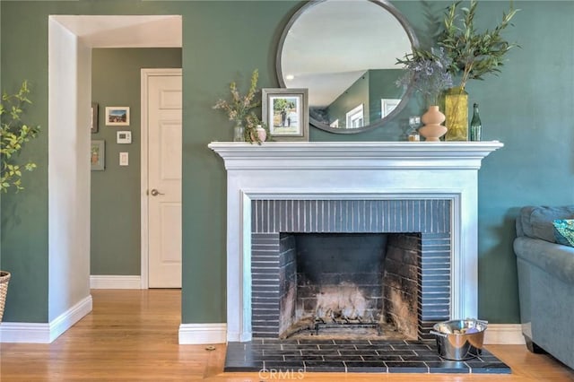 interior details featuring hardwood / wood-style flooring