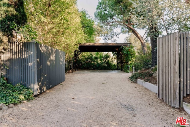 view of yard with a carport