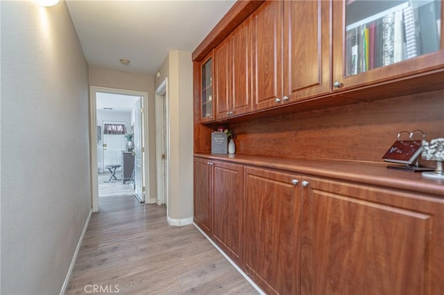 hall featuring light hardwood / wood-style floors