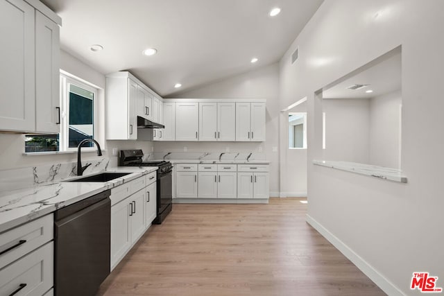 kitchen with lofted ceiling, black appliances, sink, light hardwood / wood-style floors, and white cabinetry