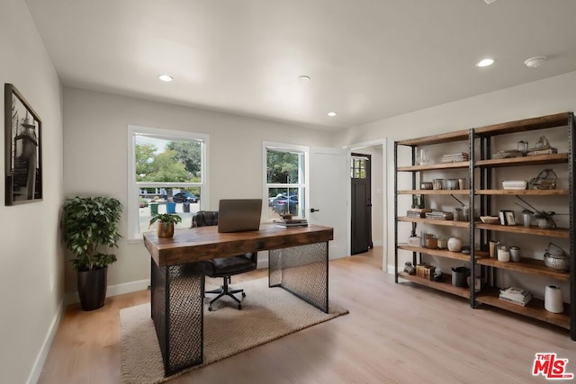 home office featuring light hardwood / wood-style flooring