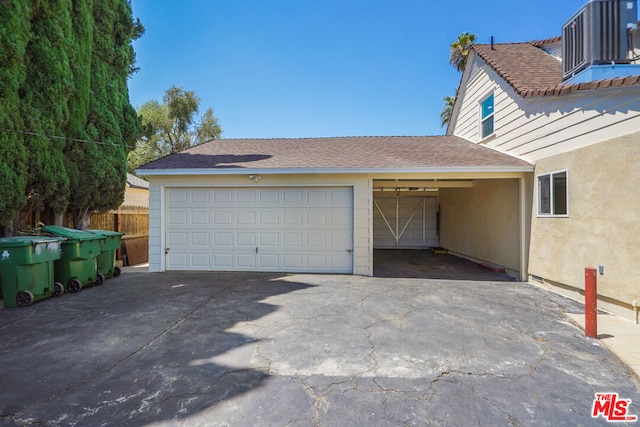 garage featuring central AC unit