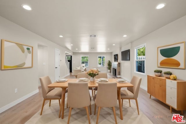 dining room featuring light hardwood / wood-style floors