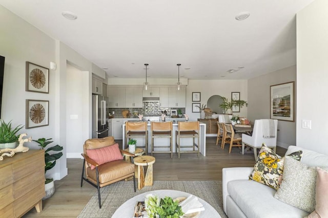 living room with light hardwood / wood-style floors