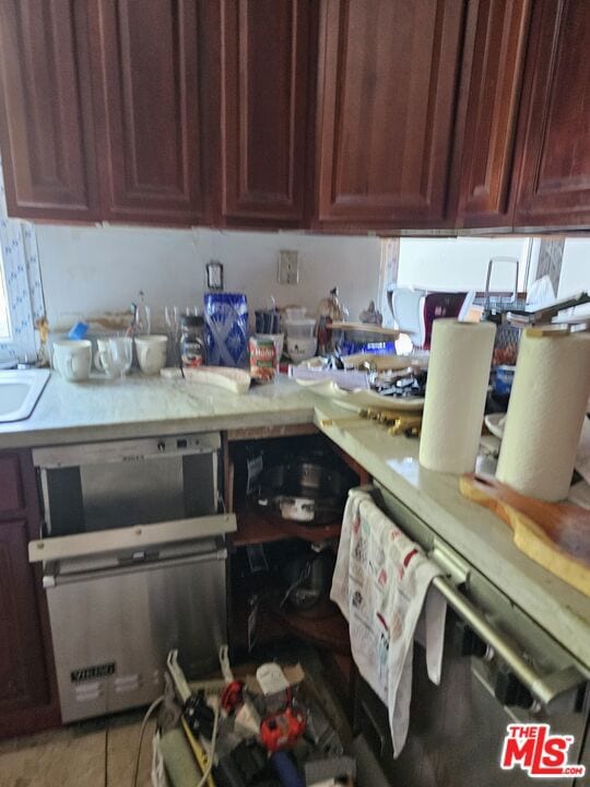 kitchen with stainless steel dishwasher