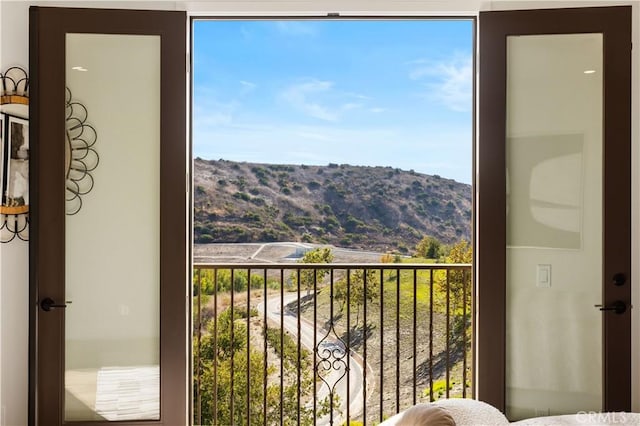 balcony featuring a mountain view