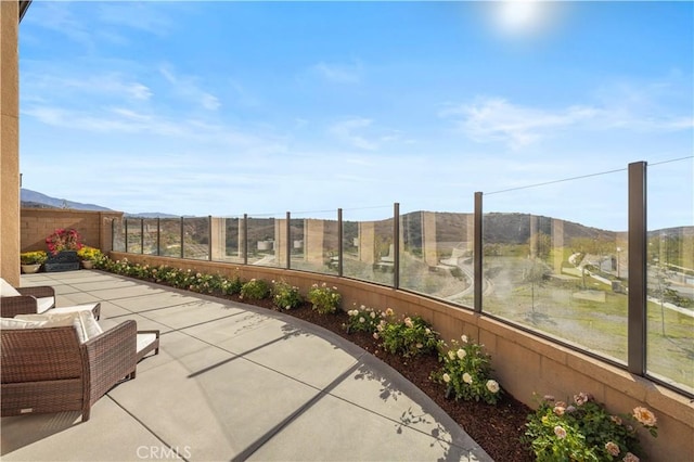 view of patio with a mountain view