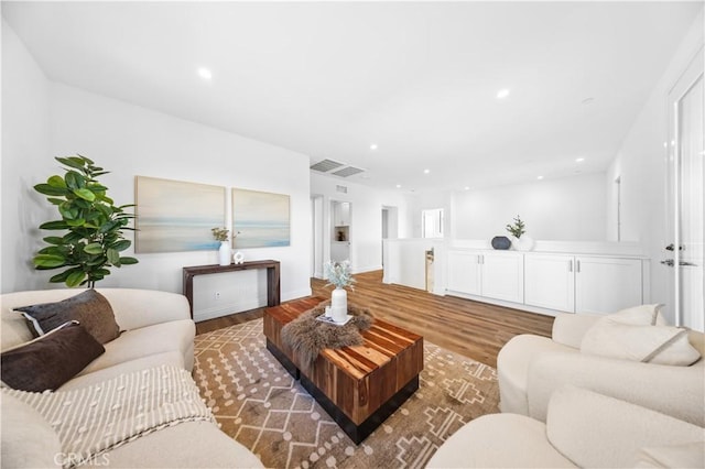 living room featuring dark hardwood / wood-style floors