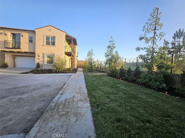 view of yard featuring a garage