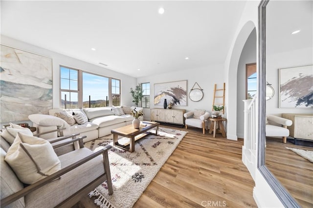 living room with light hardwood / wood-style floors