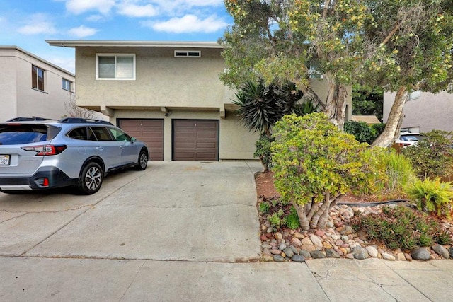 view of front of property featuring a garage