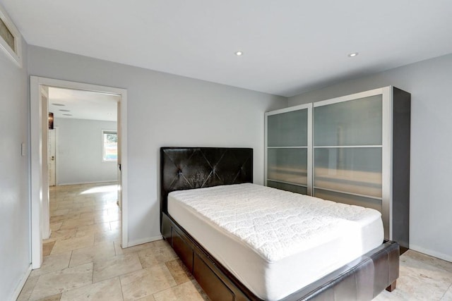 4615 Felton St Unit 2, San Diego, CA 92116 - bedroom with stone finish flooring and recessed lighting