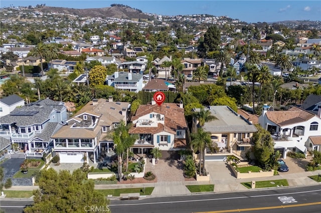 birds eye view of property featuring a mountain view