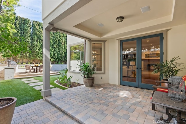 view of patio featuring french doors