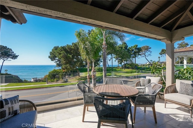 view of patio / terrace with a water view