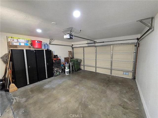 garage featuring a garage door opener