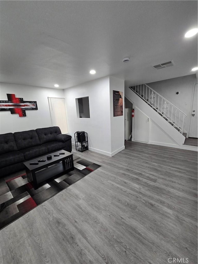 living room with hardwood / wood-style flooring