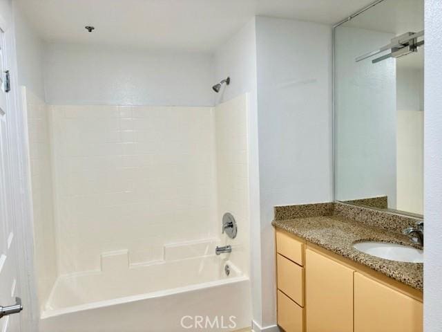 bathroom with shower / tub combination and vanity