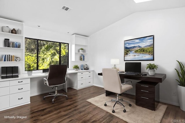 office area with vaulted ceiling, dark wood-style floors, visible vents, and baseboards