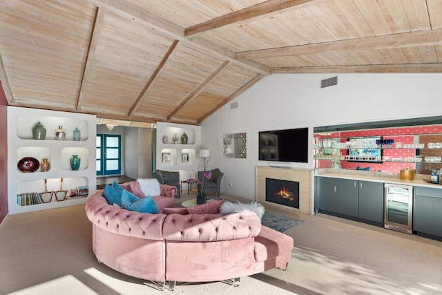 carpeted living room featuring wine cooler, lofted ceiling with beams, indoor bar, and wooden ceiling