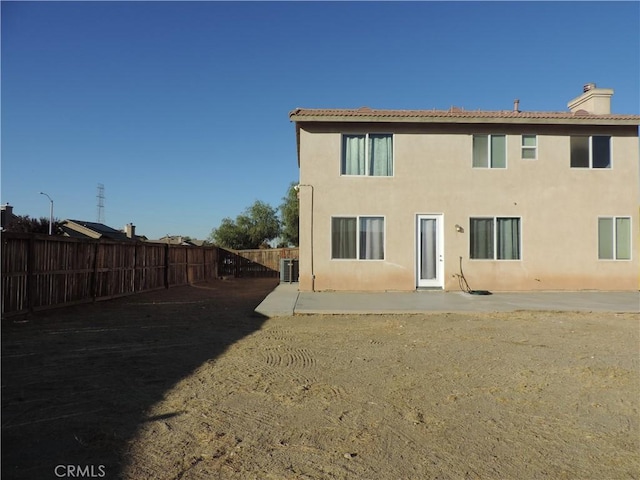 rear view of house featuring a patio area