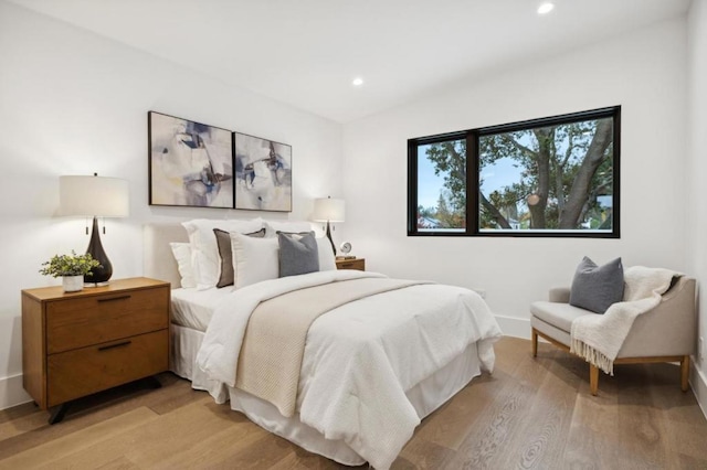 bedroom with light wood-type flooring