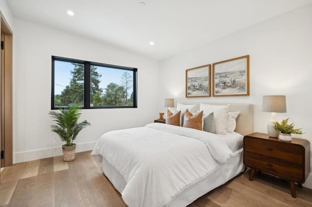 bedroom featuring hardwood / wood-style flooring