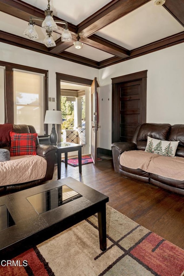 living room with beamed ceiling, dark hardwood / wood-style flooring, crown molding, and coffered ceiling