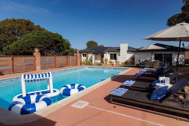 view of pool with a patio area