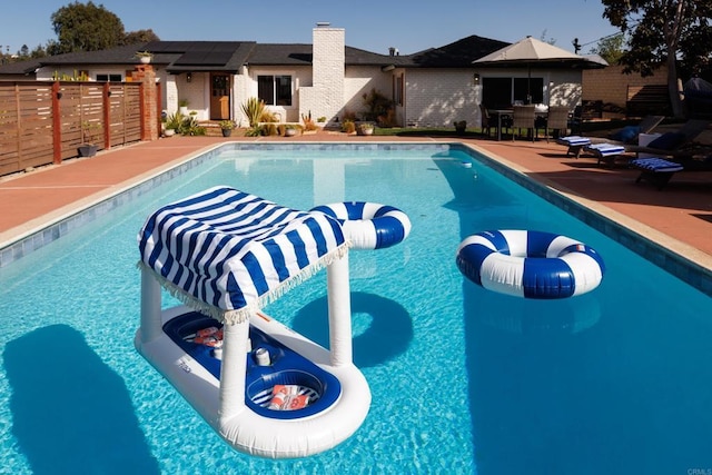 view of pool with a patio