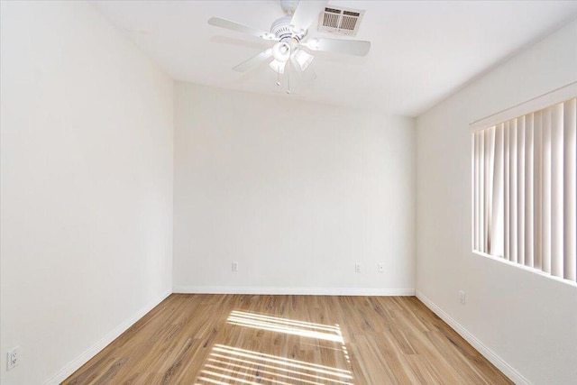 unfurnished room with ceiling fan and light hardwood / wood-style flooring