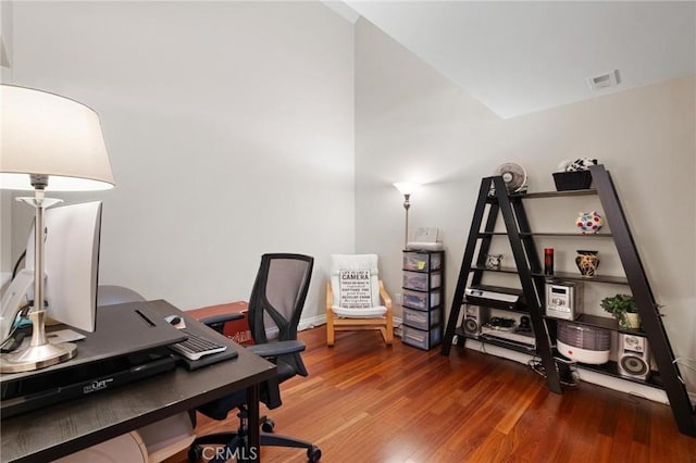 office with wood-type flooring