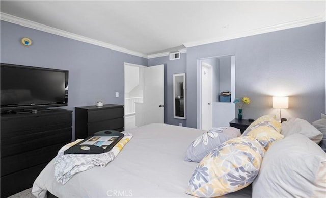 bedroom featuring crown molding