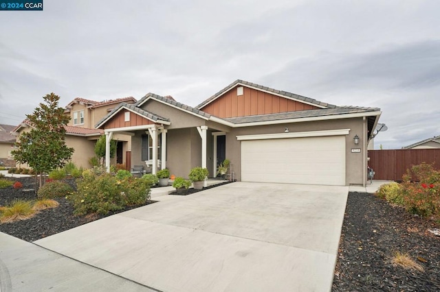 view of front of property with a garage