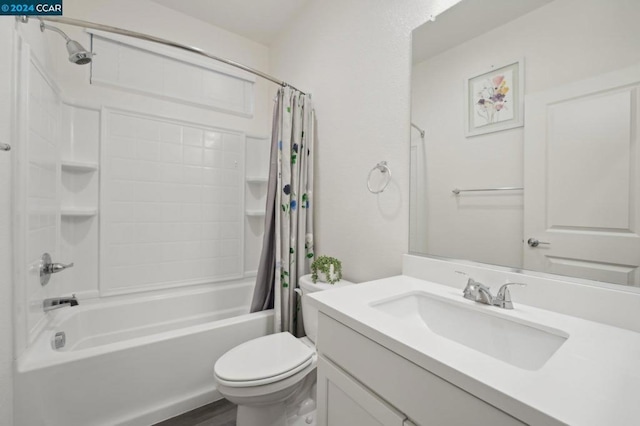 full bathroom with vanity, toilet, and shower / tub combo with curtain