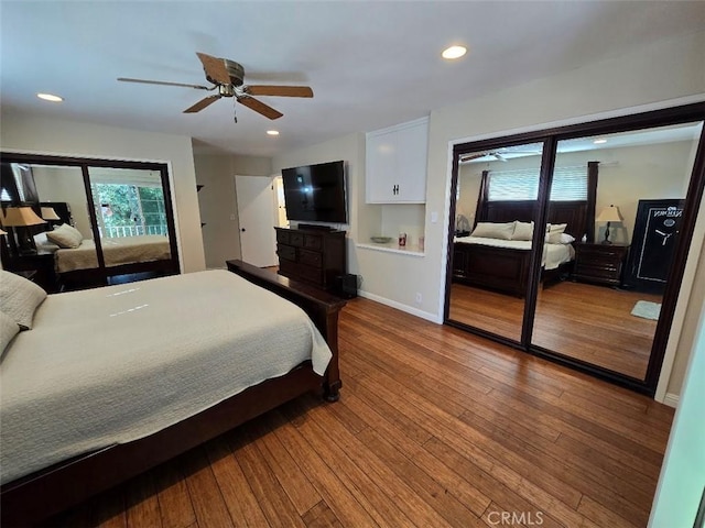 bedroom with ceiling fan and hardwood / wood-style flooring